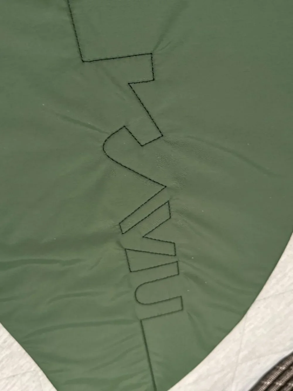 KAVU Rope Sling crossbody bag in a solid green colorway